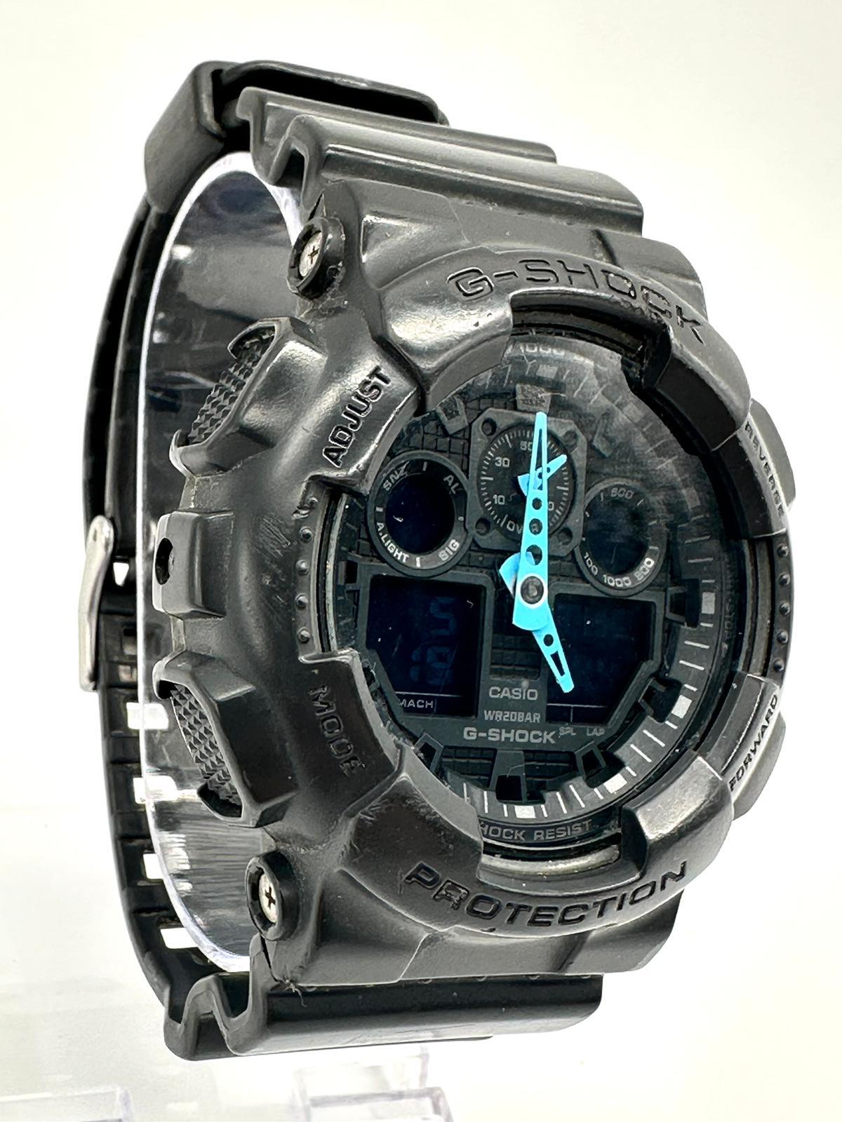 Casio G Shock GA 100C Analog Digital Display Men s Blue Black Resin Band Watch
