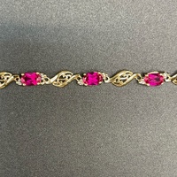 Ladies 9ct Yellow Gold Fancy Link Red Stone Bracelet