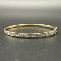 Ladies 9ct Yellow Gold Natural Diamond Oval Bangle