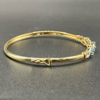 Ladies 9ct Yellow Gold Blue Stone Trifari Bangle