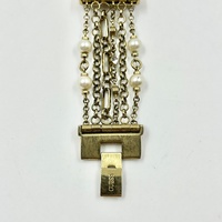 Guess W0140L2 Ladies Silk Silver Pearl Charm Watch Gold Tone Dial