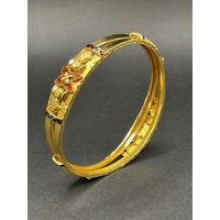Ladies 23ct Yellow Gold Round Pattern Bangle