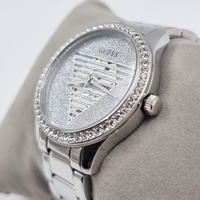 GUESS Ladies Silver Tone Triangle Dial Analog Watch GW0605L1 Stylish Chic
