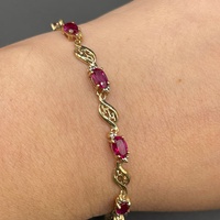 Ladies 9ct Yellow Gold Fancy Link Red Stone Bracelet