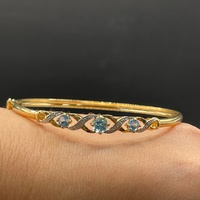 Ladies 9ct Yellow Gold Blue Stone Trifari Bangle