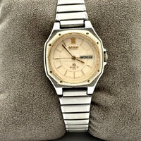 Seiko Quartz Octagonal Mens Day Date Champagne Dial Steel Bracelet