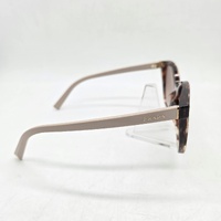 Prada PR 22ZSF 07R0A6 Ladies Sunglasses Caramel Tortoise Case 55mm