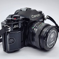 Canon Vintage A-1 35mm SLR Film Camera FD 50mm f/1.8 Lens 1984 Olympic Games Cap