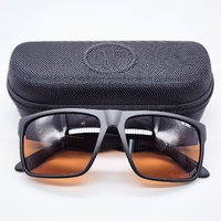 Tonic Outback 02 Polarised Photochromic Copper Sunglasses Black with Case