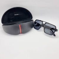 Prada Linea Rossa SPS01X Polarised Sunglasses Black Frame and Dark Grey Lenses