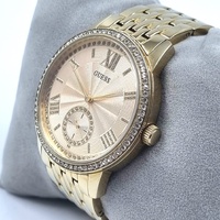 Guess W0573L2 Ladies Gold Stainless Steel Dress Watch Crystal Bezel