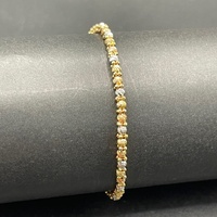 Child's 18ct Three Tone Gold Cuff Bangle