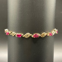 Ladies 9ct Yellow Gold Fancy Link Red Stone Bracelet