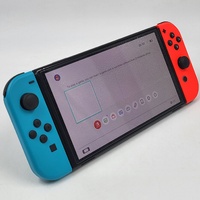 Nintendo Switch OLED Model HEG-001 Handheld Console Neon Blue Neon Red Joy-Con