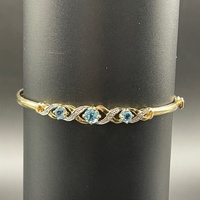 Ladies 9ct Yellow Gold Blue Stone Trifari Bangle