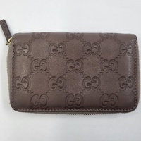 Authentic GUCCI Microguccissima Brown Leather Zip Around Wallet - 255452