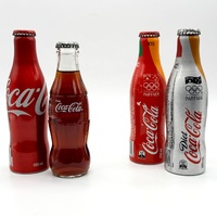 Coca-Cola Set of 4 Vintage 2012 250ml Assorted Bottles Collectible