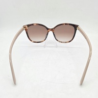 Prada PR 22ZSF 07R0A6 Ladies Sunglasses Caramel Tortoise Case 55mm