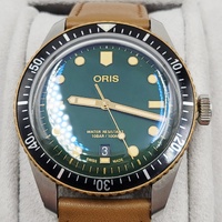 Oris Divers Sixty-Five Automatic Green Dial Steel Bronze Leather Watch Box