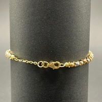 Child's 18ct Three Tone Gold Cuff Bangle