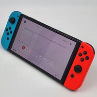 Nintendo Switch OLED Model HEG-001 Handheld Console Neon Blue Neon Red Joy-Con
