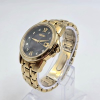 Seiko V157-0BF0 Date Display Gold Tone Stainless Steel 10Bar Solar Mens Watch