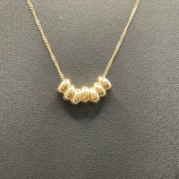 Ladies 9ct Yellow Gold Tight Curb Link Chain & 7 Lucky Rings Pendant