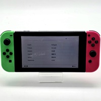 Nintendo Switch Neon Green Pink Handheld Gaming Console HAC-001 with Accessories