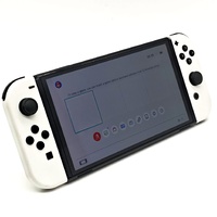 Nintendo Switch Model OLED HEG-001 64GB White Console Joy-Con Dock