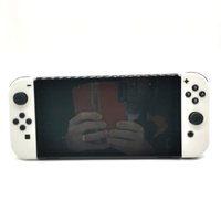 Nintendo Switch OLED Model White Handheld Gaming Console Joy-Con Dock