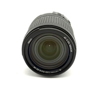 Nikon AF-S DX NIKKOR 18-140mm f/3.5-5.6G ED VR Zoom Lens and Front Cap