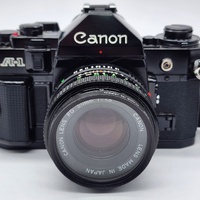 Canon Vintage A-1 35mm SLR Film Camera FD 50mm f/1.8 Lens 1984 Olympic Games Cap