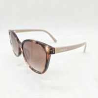 Prada PR 22ZSF 07R0A6 Ladies Sunglasses Caramel Tortoise Case 55mm