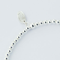 Sterling Silver Beads Stretch Bracelet with Peace Charm 4.15 Grams NEW