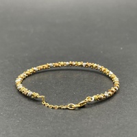 Child's 18ct Three Tone Gold Cuff Bangle