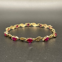 Ladies 9ct Yellow Gold Fancy Link Red Stone Bracelet