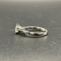 This Ladies 14ct White Gold Natural Diamond Engagement Ring