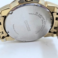 Seiko V157-0BF0 Date Display Gold Tone Stainless Steel 10Bar Solar Mens Watch