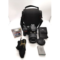 Nikon D3500 DSLR Camera with 18-55mm Lens with Battery Charger and Case