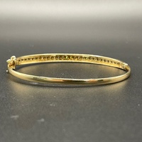 Ladies 9ct Yellow Gold Natural Diamond Oval Bangle