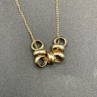 Ladies 9ct Yellow Gold Tight Curb Link Chain & 7 Lucky Rings Pendant