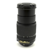 Nikon AF-S DX NIKKOR 18-140mm f/3.5-5.6G ED VR Zoom Lens and Front Cap