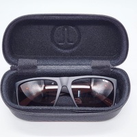 Tonic Outback 02 Polarised Photochromic Copper Sunglasses Black with Case