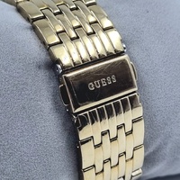 Guess W0573L2 Ladies Gold Stainless Steel Dress Watch Crystal Bezel