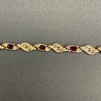 Ladies 9ct Yellow Gold Fancy Link Red Stone Bracelet
