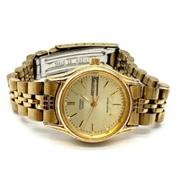 Citizen Quartz Gold Tone Day Date Watch Champagne Dial