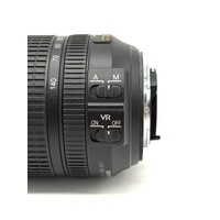 Nikon AF-S DX NIKKOR 18-140mm f/3.5-5.6G ED VR Zoom Lens and Front Cap