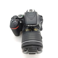 Nikon D3500 DSLR Camera with 18-55mm Lens with Battery Charger and Case