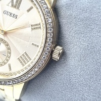Guess W0573L2 Ladies Gold Stainless Steel Dress Watch Crystal Bezel