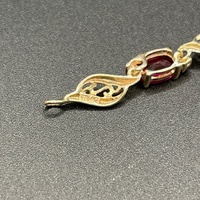 Ladies 9ct Yellow Gold Fancy Link Red Stone Bracelet